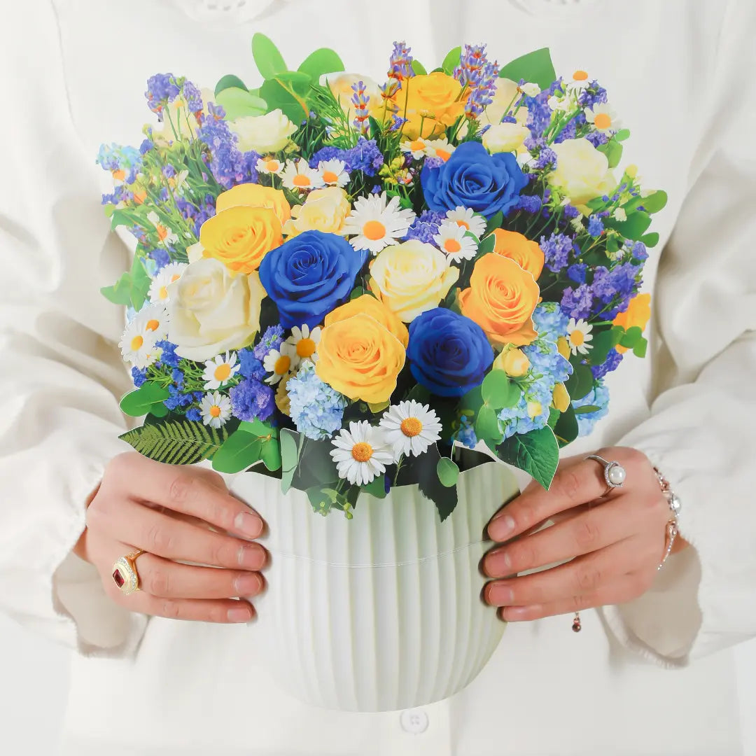 Cerulean-Dream-paper-pop-up-bouquet-of-blue-and-gold-roses-—-PetalPal